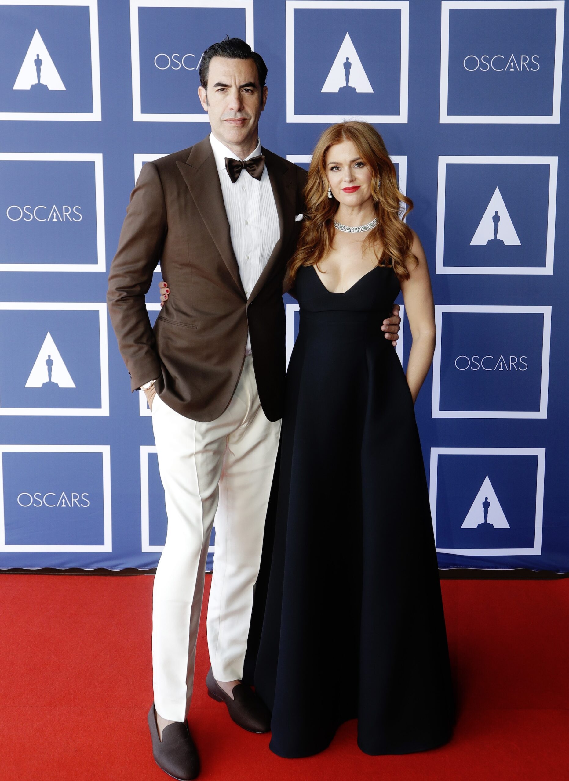 Sacha Baron Cohen and Isla Fisher pose for a photo during a screening of the Oscars on Monday April 26, 2021 in Sydney, Australia.