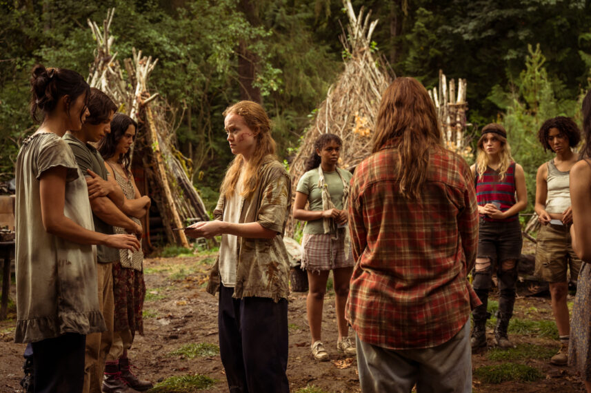 L-R: Alexa Barajas as Teen Mari, Kevin Alves as Teen Travis, Courtney Eaton as Teen Lottie, Liv Hewson as Teen Van, Silvana Estifanos as Teen Britt, Sophie Thatcher as Teen Natalie and Jasmin Savoy Brown as Teen Taissa in 'Yellowjackets' Season 3 Episode 5