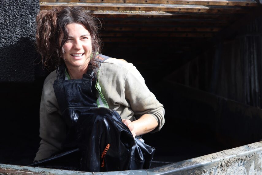 Tatiana Costa looking happy and smiling during clean up