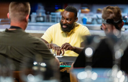 Host Eric Adjepong deals cards for round 2, as seen on Wildcard Kitchen, Season 2