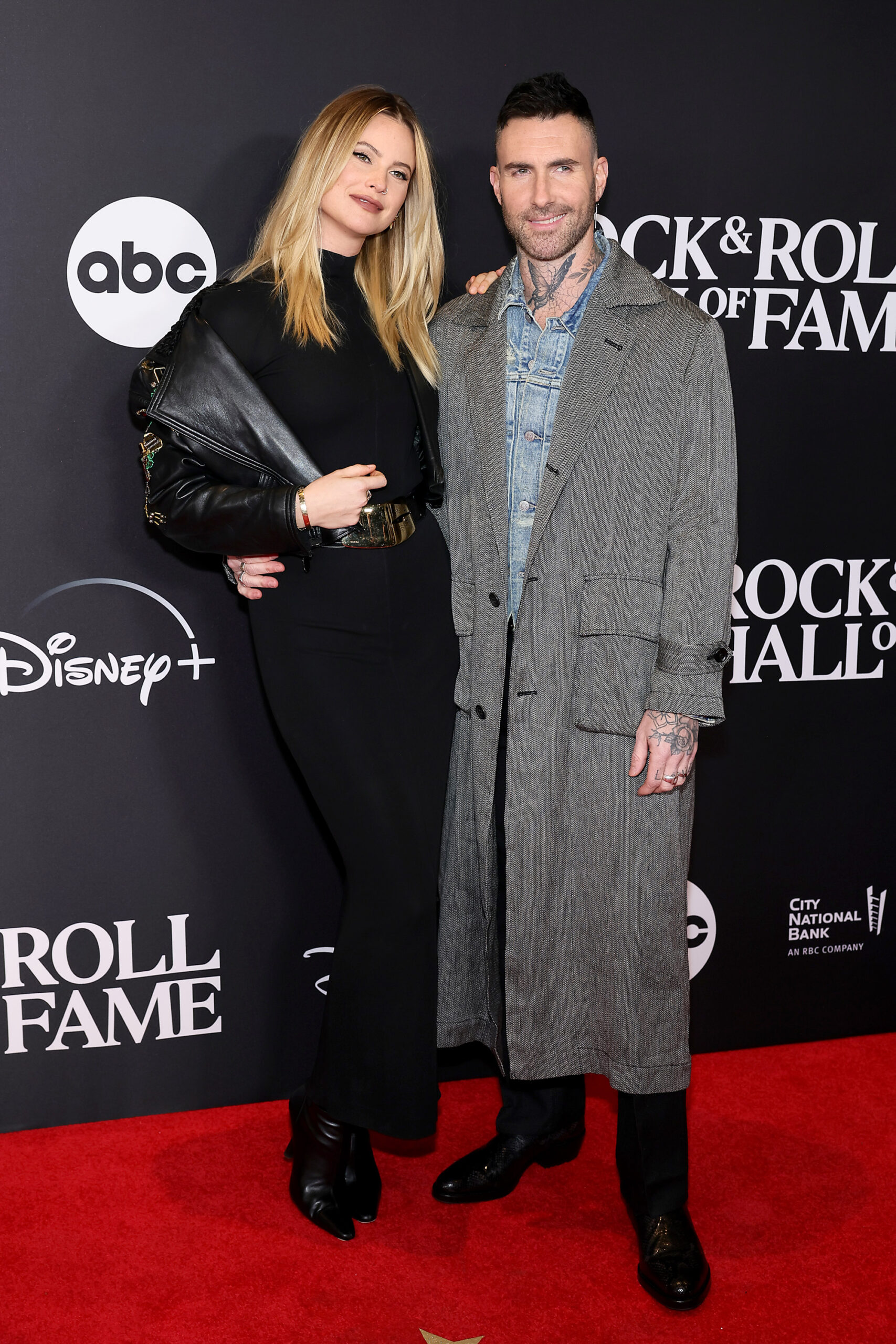 Behati Prinsloo and Adam Levine attend the 38th Annual Rock & Roll Hall Of Fame Induction