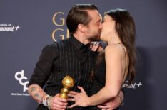 Kieran Culkin, winner of the Best Performance by a Male Actor in a Supporting Role in Any Motion Picture award for “A Real Pain,” and Jazz Charton pose in the press room during the 82nd Annual Golden Globe Award at The Beverly Hilton on January 05, 2025 in Beverly Hills, California.