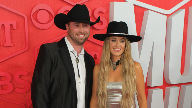 Devlin "Duck" Hodges and Lainey Wilson (R) attend the 2024 CMT Music Awards