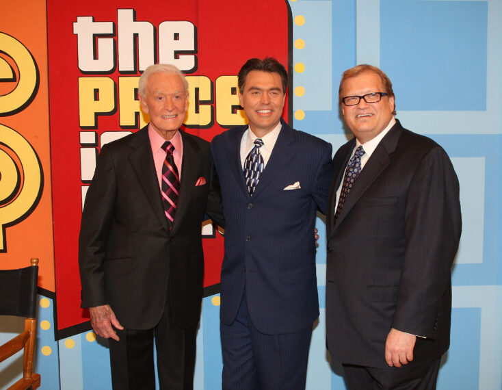 Bob Barker, announcer Rich Fields and host Drew Carey speak during a segment of "The Price Is Right"