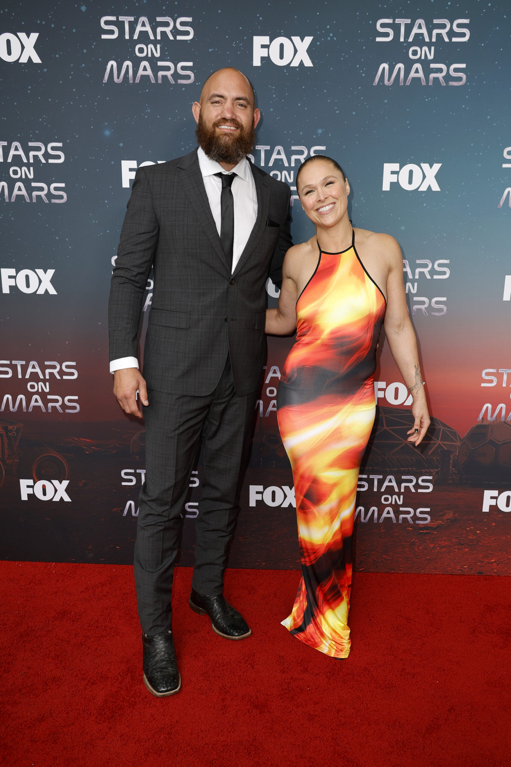 Travis Browne and Ronda Rousey attend FOX's Stars On Mars 