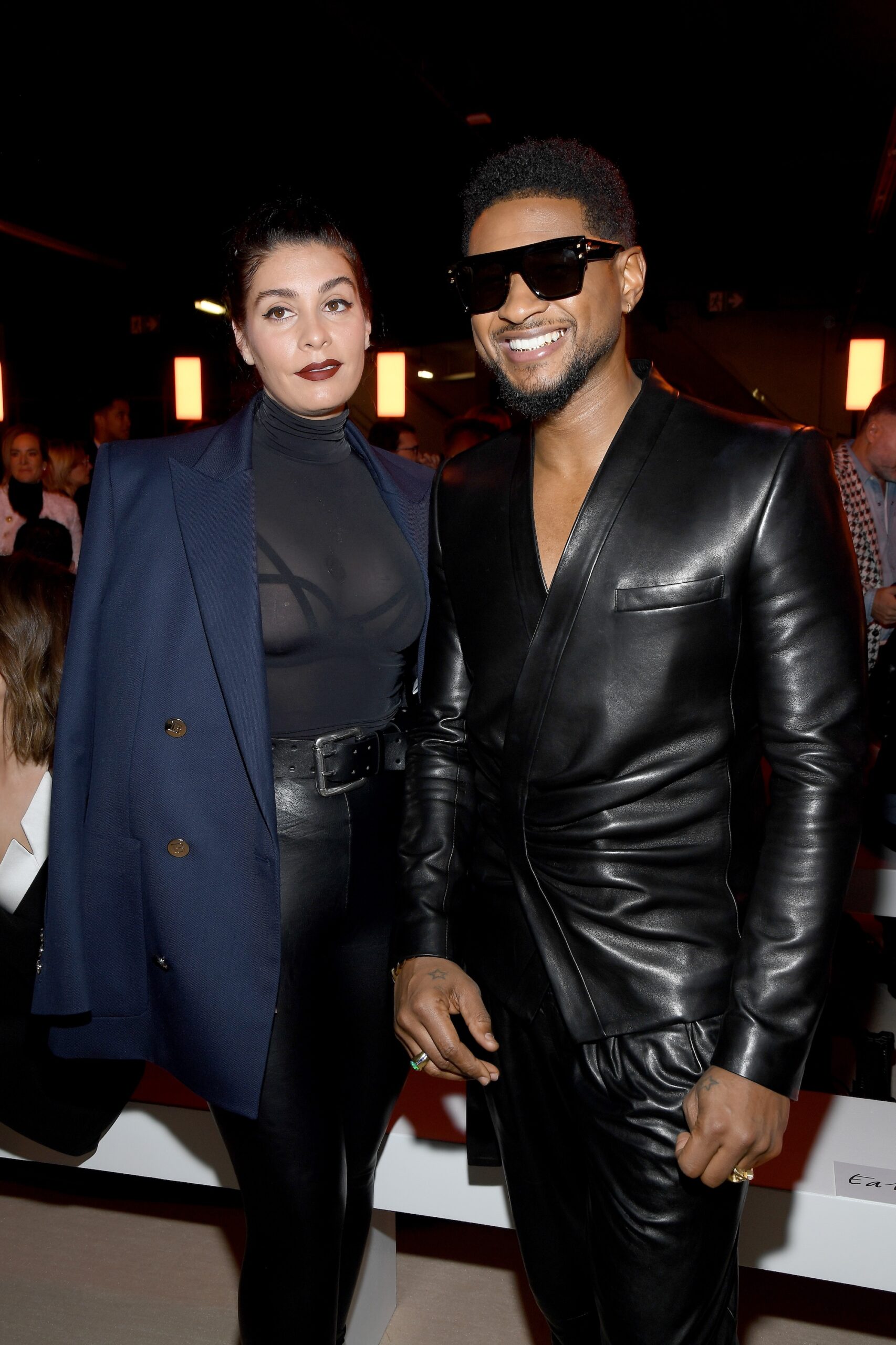 Jenn Goicoechea and Usher attend the Balmain show