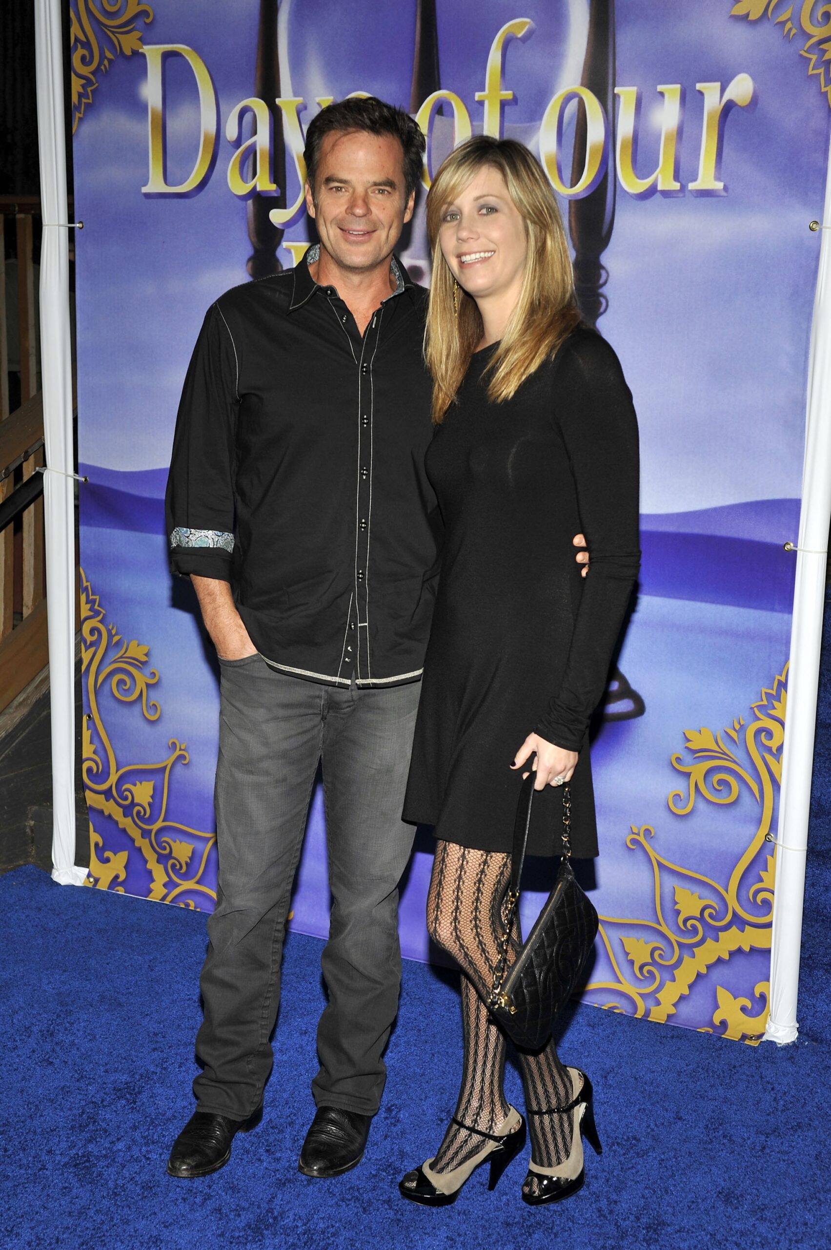 Wally Kurth and wife Debra Yuhasz pose for a picture at the 