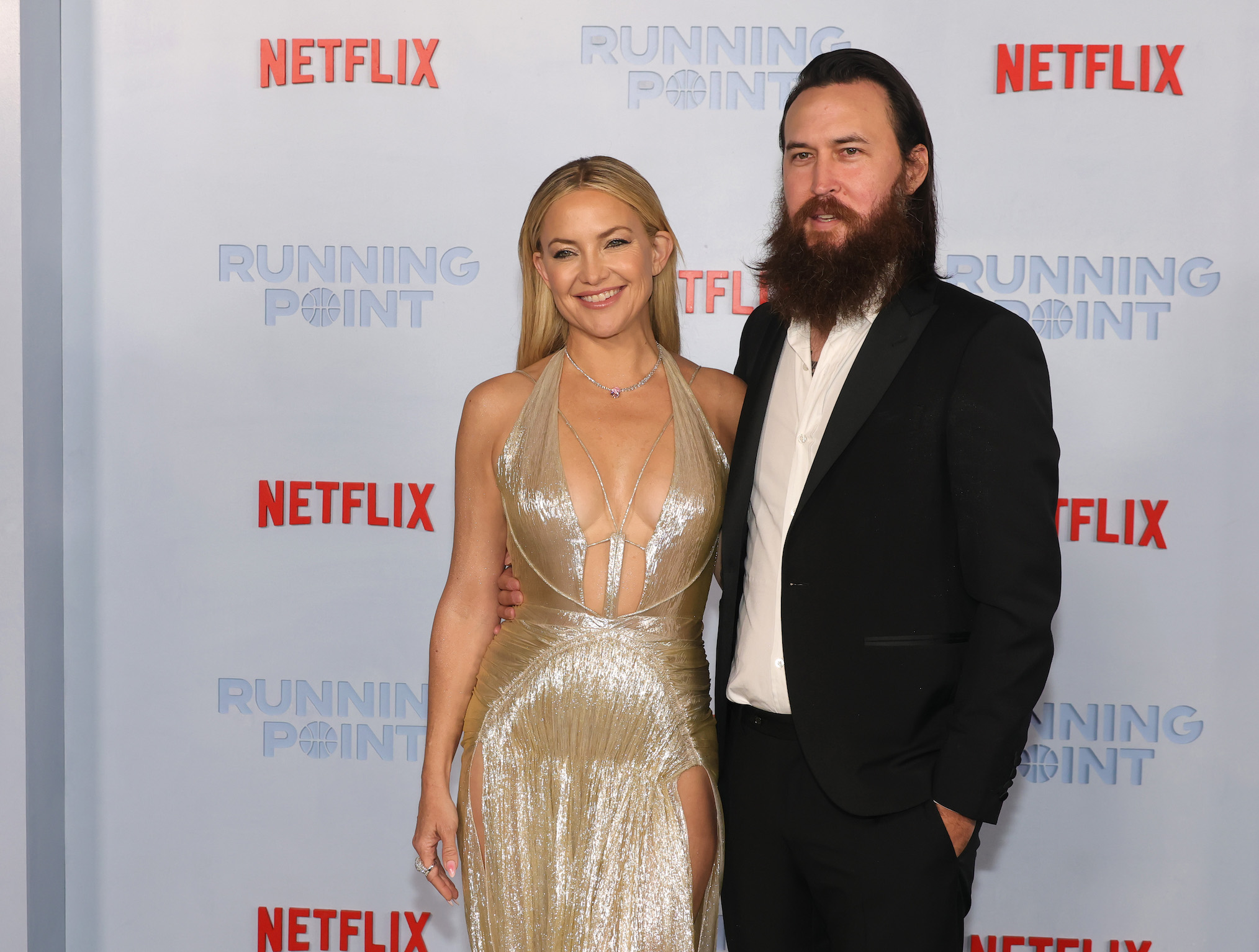 LOS ANGELES, CALIFORNIA - FEBRUARY 13: (L-R) Kate Hudson and Danny Fujikawa attend the premiere of Netflix's 