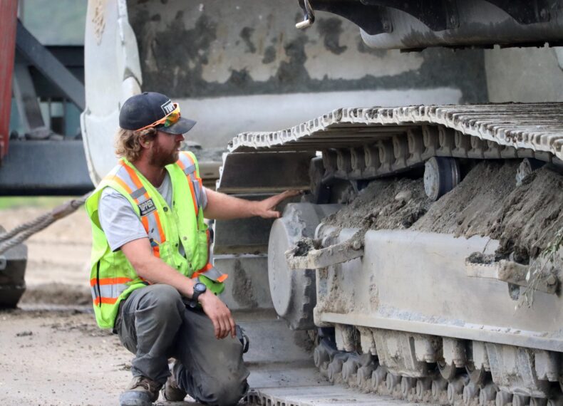 Tyson Lee checking out excavator tracks