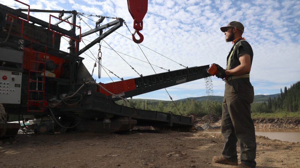 Kevin Beet operating crane next to washplant