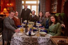 Tristan Farnon (Callum Woodhouse), Mrs. Hall (Anna Madeley), Richard Alderson (Tony Pitts), Siegfried Farnon (Samuel West), Jenny Alderson (Imogen Clawson), James Herriot (Nicholas Ralph), and Helen Herriot (Rachel Shenton) in All Creatures Great and Small Season 5 Christmas episode