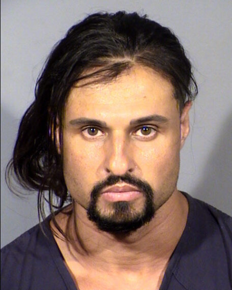 In this handout photo provided by the Las Vegas Metropolitan Police Department, Ash Armand poses for a mugshot on June 17, 2020 in Las Vegas, Nevada