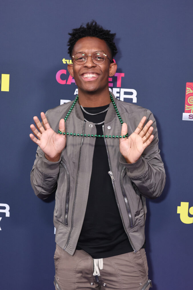 Breland attends the purple carpet during the Super Bowl LIX