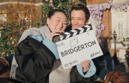 Yerin Ha and Luke Thompson shooting a scene in 'Bridgerton' Season 4