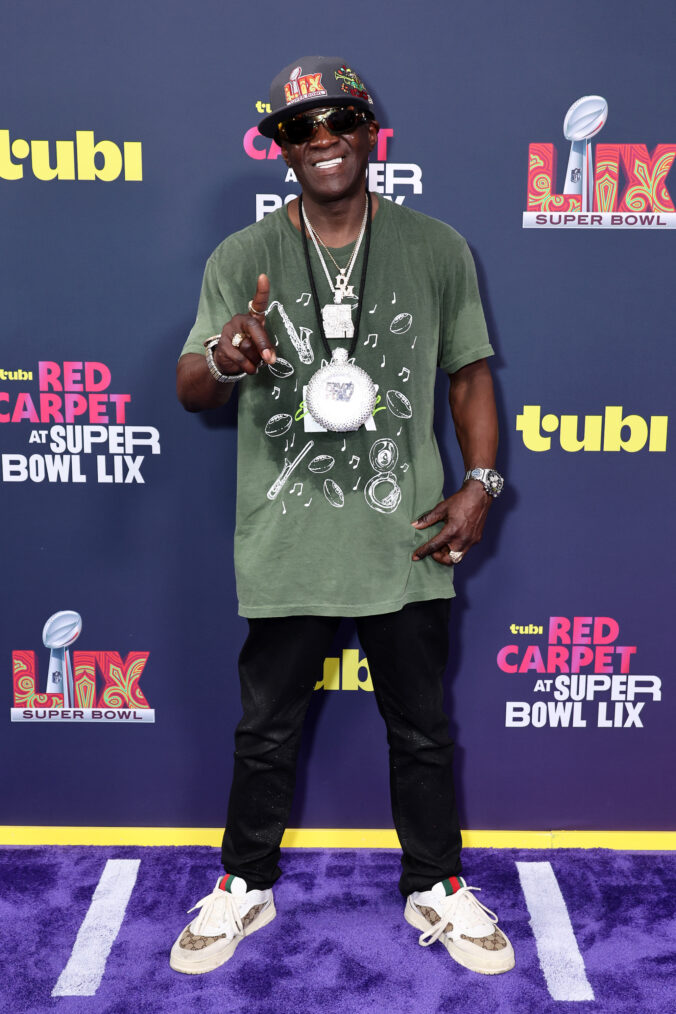 Flavor Flav attend the purple carpet during the Super Bowl LIX