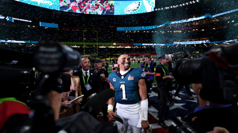 alen Hurts #1 of the Philadelphia Eagles celebrates after Philadelphia beat Kansas City 40-22 to win Super Bowl LIX