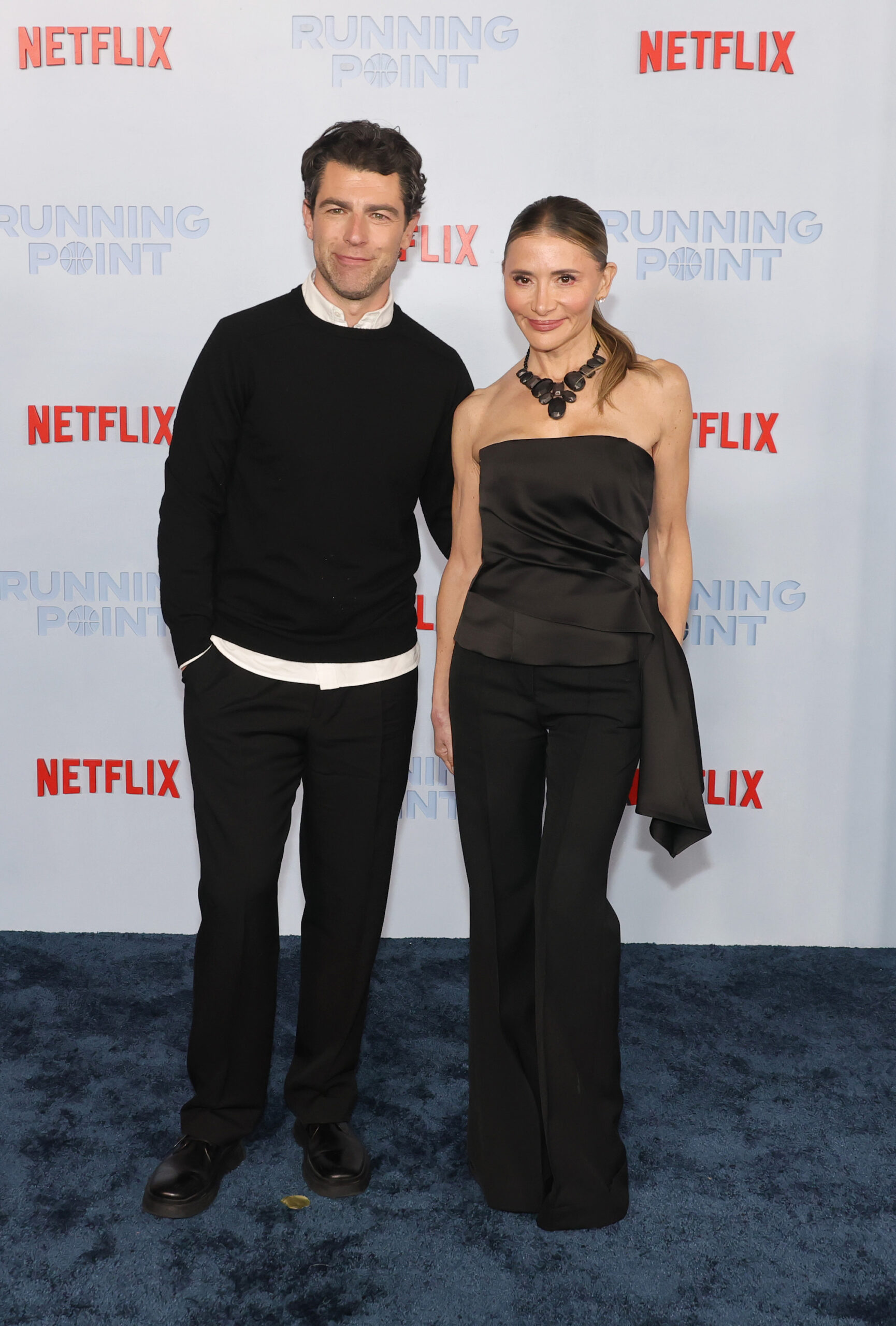 LOS ANGELES, CALIFORNIA - FEBRUARY 13: Max Greenfield and Tess Sanchez attend the premiere of Netflix's 