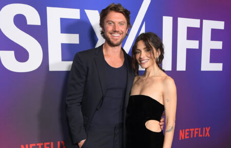 Adam Demos and Sarah Shahi attend Netflix's 