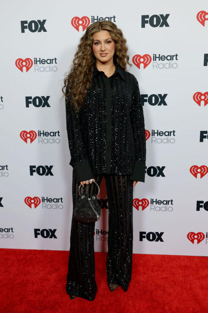 HOLLYWOOD, CALIFORNIA - MARCH 17: Tori Kelly attends the 2025 iHeartRadio Music Awards at Dolby Theatre on March 17, 2025 in Hollywood, California.