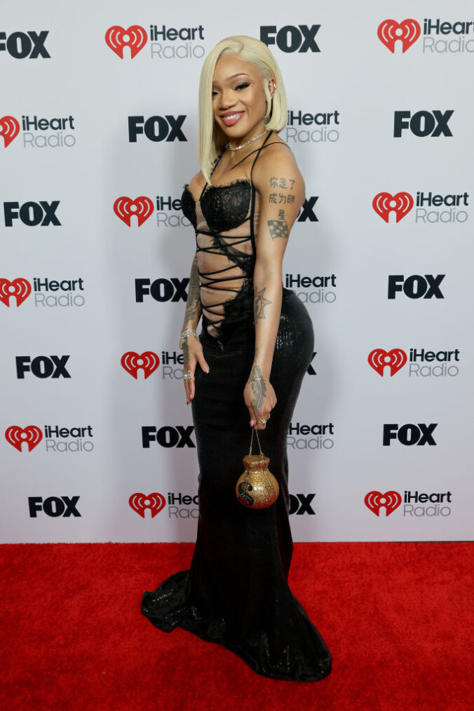 HOLLYWOOD, CALIFORNIA - MARCH 17: GloRilla attends the 2025 iHeartRadio Music Awards at Dolby Theatre on March 17, 2025 in Hollywood, California.