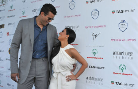 Kim Kardashian and Kris Humphries arrive to attend the AmberLounge Fashion Monaco 2011